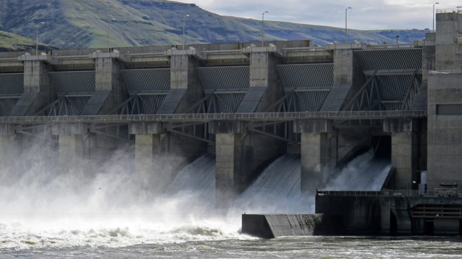 FILE - Water moves through a spillway of the Lower Granite Dam on the Snake River near Almota, Wash., April 11, 2018. The U.S. government said Thursday, Dec. 14, 2023, that it plans to spend more than $1 billion over the next decade to help recover depleted populations of salmon in the Pacific Northwest. It also committed to helping figure out how to offset the hydropower, transportation and other benefits provided by four controversial dams on the Snake River, should Congress ever agree to breach them. (AP Photo/Nicholas K. Geranios, File)