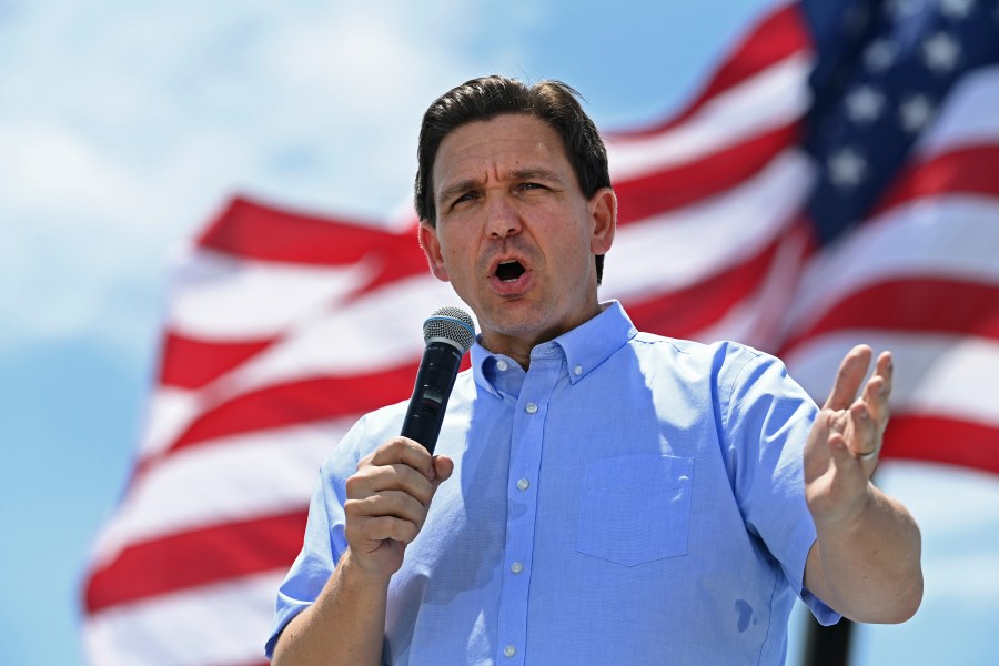 FILE - Republican presidential candidate and Florida Gov. Ron DeSantis speaks at an annual Basque Fry at the Corley Ranch in Gardnerville, Nev., Saturday, June 17, 2023. The mother of a transgender girl sobbed in federal court Wednesday, Dec. 13, 2023, as she contemplated having to move away from her Navy officer husband to get health care for her 12-year-old if Florida's ban on gender dysphoria treatments for minors is allowed to take affect. (AP Photo/Andy Barron, File)