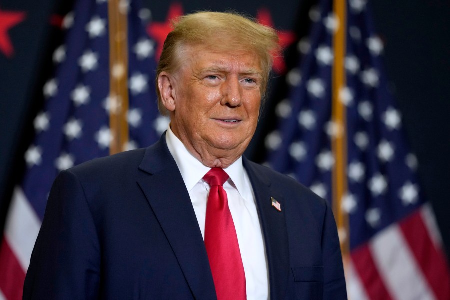 FILE - Former President Donald Trump speaks during a commit to caucus rally, Dec. 19, 2023, in Waterloo, Iowa. Police said Tuesday, Dec. 26, 2023, they are investigating incidents directed at Colorado Supreme Court justices and providing extra patrols around their homes in Denver following the court's decision to remove Trump from the state's presidential primary ballot. (AP Photo/Charlie Neibergall, File)