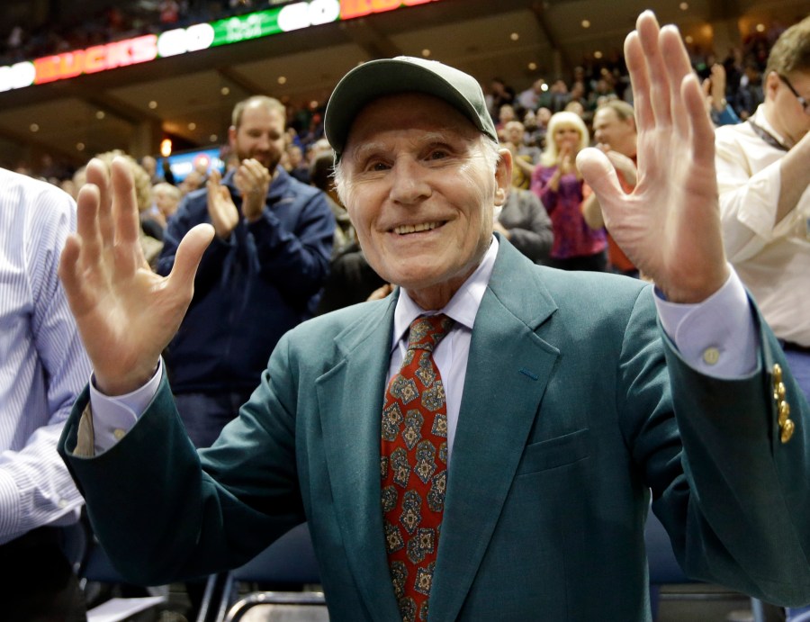 FILE - Milwaukee Bucks owner Herb Kohl is acknowledged by fans during the first half of an NBA basketball game against the Atlanta Hawks, Wednesday, April 16, 2014, in Milwaukee. Herb Kohl, a former Democratic U.S. senator from Wisconsin and former owner of the Milwaukee Bucks basketball team, has died, an email from his foundation said Wednesday, Dec. 27, 2023. He was 88. (AP Photo/Morry Gash, File)