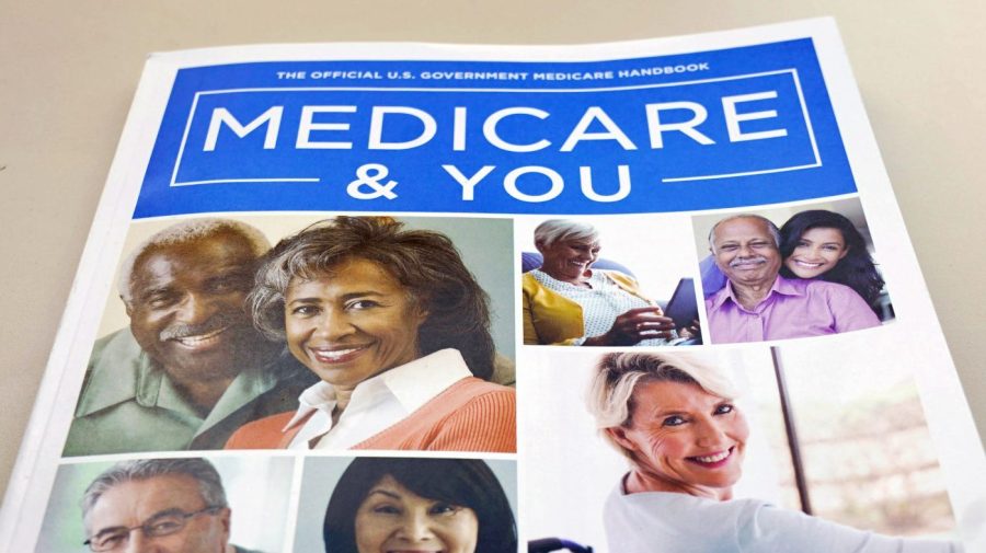 FILE - The U.S. Medicare Handbook is photographed in Washington, Nov. 8, 2018. Obesity drugs like Wegovy and Zepbound that are capturing the attention of celebrities and showing promising results in helping people shed pounds will stay out of reach for America's older adults. A decades-old law on the books bans Medicare from paying for weight loss drugs. (AP Photo/Pablo Martinez Monsivais, File)