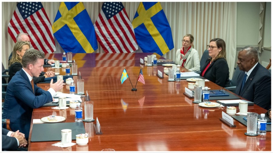 Defense Secretary Lloyd Austin, right, speaks during a meeting with Swedish Defense Minister Pal Jonson, left, at the Pentagon on Tuesday, Dec. 5, 2023, in Washington. (AP Photo/Kevin Wolf)