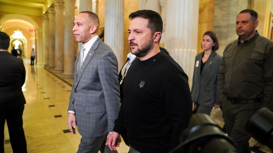 Minority Leader Hakeem Jeffries (D-N.Y.) and Ukrainian President Volodymyr Zelensky following a meeting at the Capitol on Dec. 12, 2023.