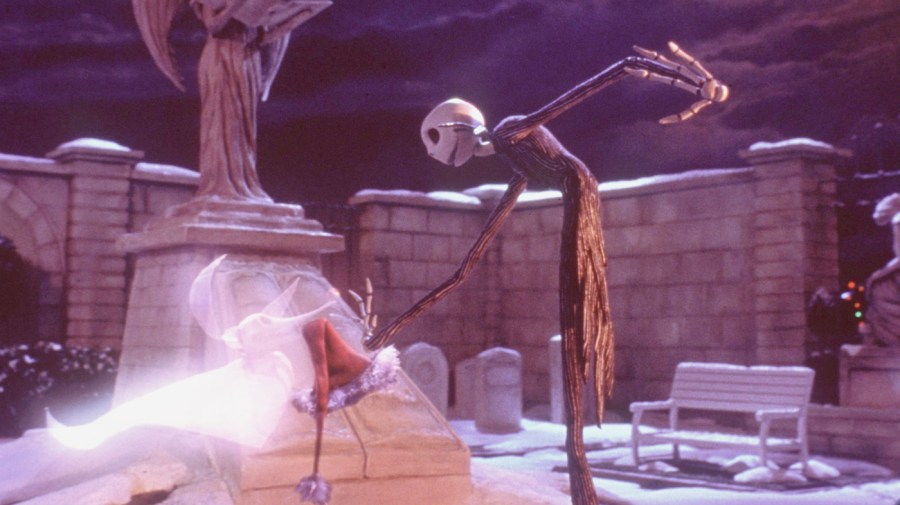 Hat in hand, a sadder-but-wiser Jack Skellington gets a boost from his ghost dog, Zero, when he and his plans for a "new and improved" Christmas get shot down and he realizes for the first time that scaring people is what he does best in the Touchstone Pictures animated film “The Nightmare Before Christmas.”