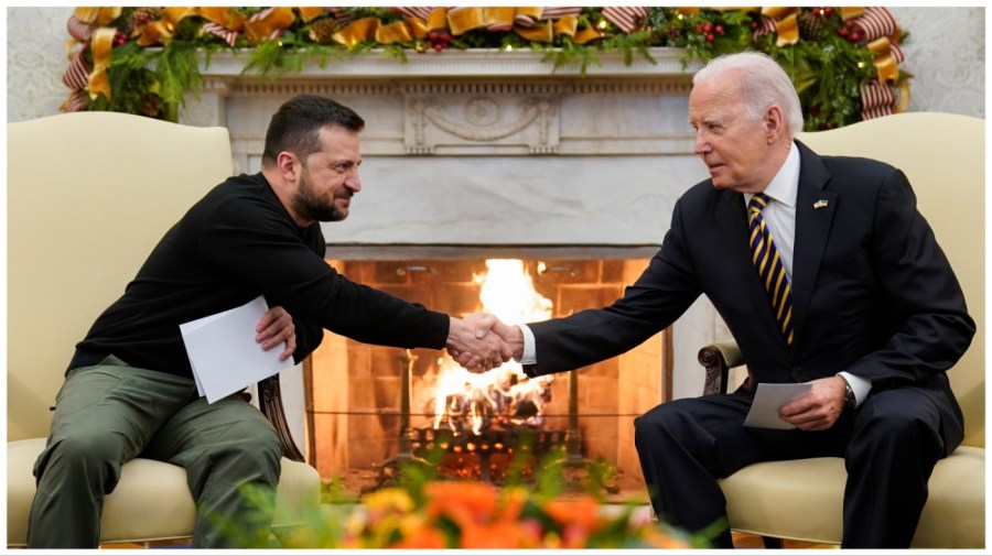 President Joe Biden shakes hands with Ukrainian President Volodymyr Zelenskyy as they meet in the Oval Office of the White House, Tuesday, Dec. 12, 2023, in Washington. (AP Photo/Evan Vucci)