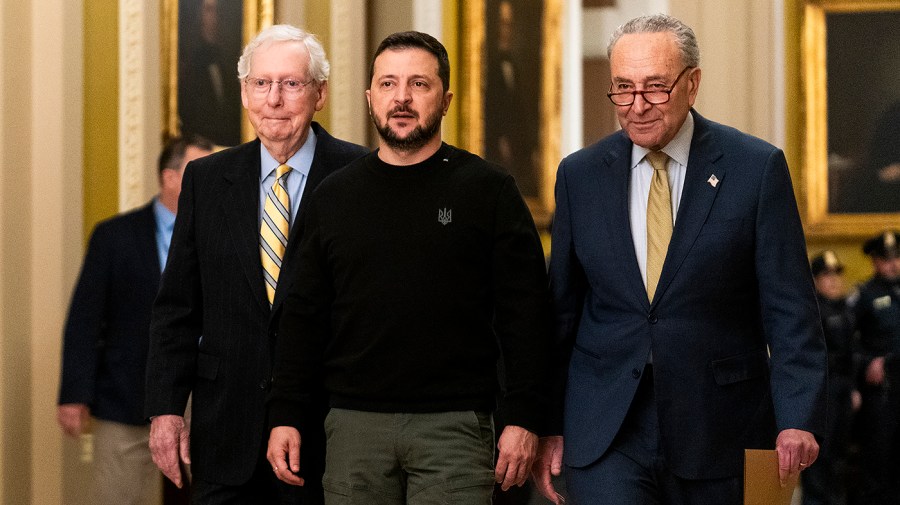 Ukrainian President Volodymyr Zelensky arrives to the Senate accompanied by Minority Leader Mitch McConnell (R-Ky.) and Majority Leader Chuck Schumer (D-N.Y.)