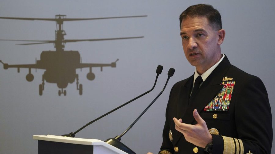 FILE - U.S. Navy Vice Adm. Brad Cooper, who heads the Navy's Bahrain-based 5th Fleet, speaks at an event at the International Defense Exhibition and Conference in Abu Dhabi, United Arab Emirates, Feb. 21, 2023. The top commander of U.S. naval forces in the Middle East says Yemen’s Houthi rebels are showing no signs of ending their “reckless” attacks on commercial ships in the Red Sea. But Vice Adm. Brad Cooper said in an Associated Press interview on Saturday that more nations are joining the international maritime mission to protect vessels in the vital waterway and trade traffic is beginning to pick up. (AP Photo/Jon Gambrell, File)