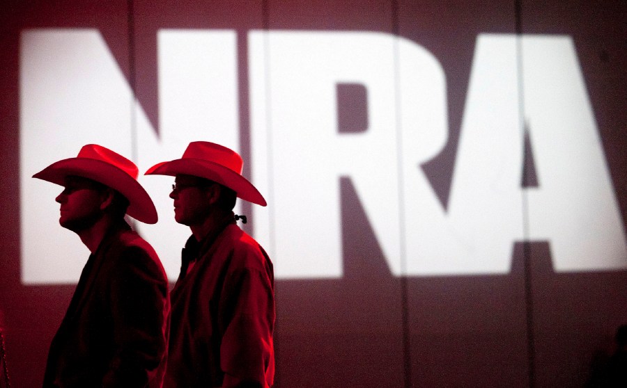 FILE - National Rifle Association members listen to speakers during the NRA's Annual Meetings and Exhibits at the George R. Brown Convention Center, May 4, 2013, in Houston. An NRA lawyer acknowledged in court Tuesday, Jan. 9, 2024, that some former executives and outside vendors may have ripped off the influential gun rights group with lavish spending and self-dealing. (Johnny Hanson/Houston Chronicle via AP, File)