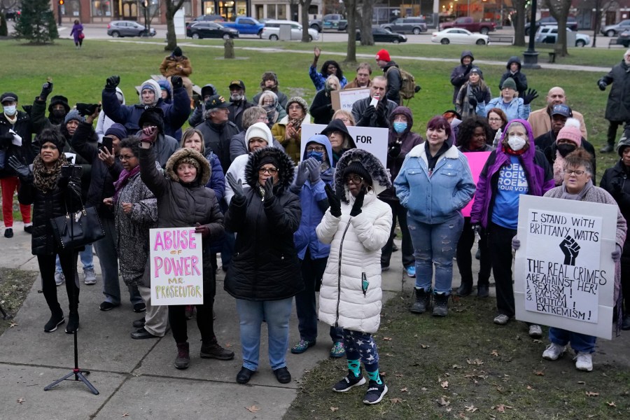 Supporters of Brittany Watts cheer at a rally Thursday, Jan. 11, 2024, in Warren Ohio. A grand jury has decided that Watts, who was facing criminal charges for her handling of a home miscarriage, will not be charged. (AP Photo/Sue Ogrocki)