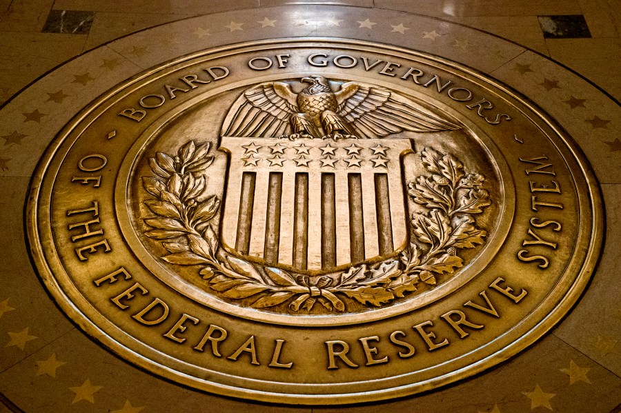 FILE- The seal of the Board of Governors of the United States Federal Reserve System is shown at the Marriner S. Eccles Federal Reserve Board Building in Washington on Feb. 5, 2018. (AP Photo/Andrew Harnik, File)