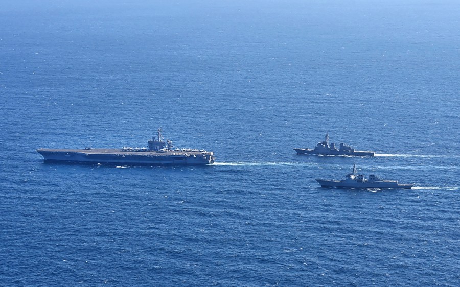 In this photo provided by South Korea's Joint Chiefs of Staff, the aircraft carrier USS Carl Vinson, left, sails with South Korean Navy's Aegis destroyer King Sejong the Great and Japan's Maritime Self-Defense Force Aegis destroyer Kongou in the international waters of the southern coast of Korean peninsular during a recent joint drill in 2024. The three countries conducted combined naval exercises involving the American aircraft carrier in their latest show of strength against nuclear-armed North Korea, South Korea’s military said Wednesday, Jan. 17, as the three countries' senior diplomats were to meet in Seoul to discuss the deepening standoff with Pyongyang. (South Korea's Joint Chiefs of Staff via AP)