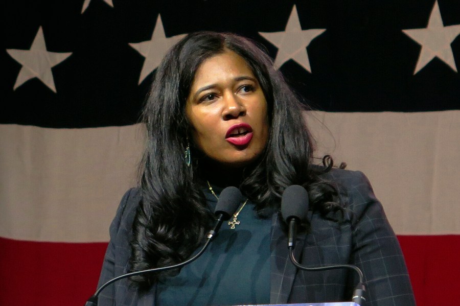 FILE - Kristina Karamo speaks to Michigan Republican Party delegates on Feb. 18, 2023, in Lansing, Mich. The recently installed chair of Michigan's Republican Party and others in the state GOP are suing to get the group's former leader, Karamo, officially declared as being removed from the post. Malinda Pego, Michigan GOP administrative vice chair Ali Hossein and party coalitions vice chair Hassan Nehme are among plaintiffs in the lawsuit filed Friday, Jan. 19, 2024 in Kent County Circuit Court in Grand Rapids. (AP Photo/Joey Cappelletti, File)