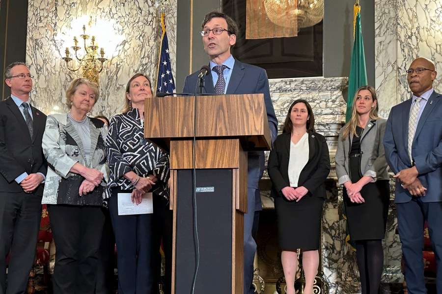 Washington Attorney General Bob Ferguson speaks on Wednesday, Jan. 24, 2024, in Olympia, Wash. Ferguson announced a $149.5 million settlement Wednesday with drugmaker Johnson & Johnson, more than four years after the state sued the company over its role fueling the opioid addiction crisis. (AP Photo/Manuel Valdes)