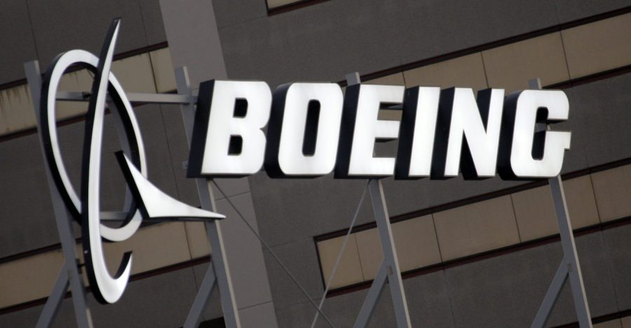 The Boeing logo is seen on the side of a building.