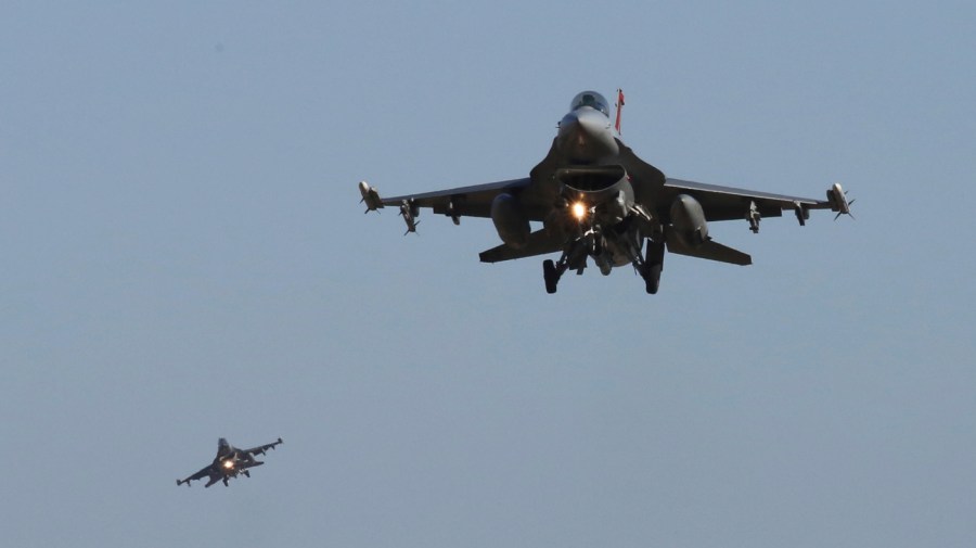 U.S. Air Force F-16 fighter jets fly over the Osan U.S. Air Base during a combined air force exercise with the United States and South Korea in Pyeongtaek, South Korea, Dec. 4, 2017.