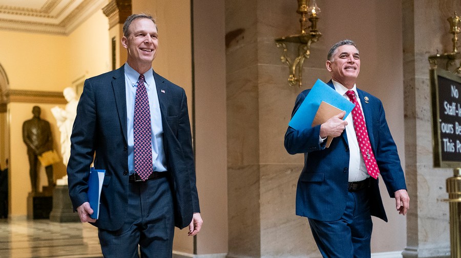 Reps. Scott Perry (R-Pa.) and Andrew Clyde (R-Ga.)