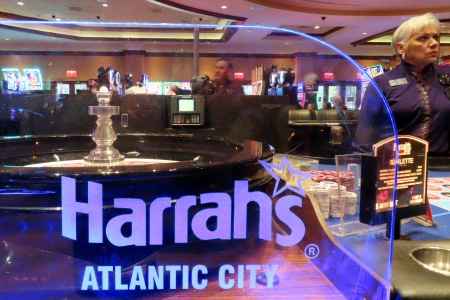 A dealer waits for customers at Harrah's casino in Atlantic City N.J. on Sept. 29, 2023. Figures released on Friday, Feb. 16, 2024 from state gambling regulators show the total amount won by Atlantic City's nine casinos, the three horse tracks that take sports bets, and their online partners was more than $559 million in January, up 28% from a year earlier. But much of that was powered by a record-setting month of internet gambling ($183 million, up nearly 20% from a year ago) and sports betting (nearly $171 million, up more than 136%). (AP Photo/Wayne Parry)