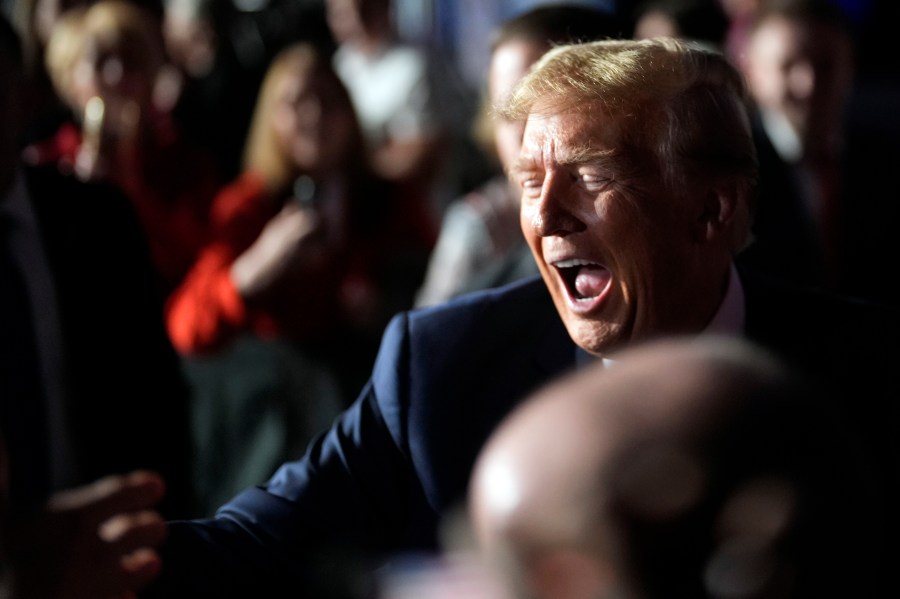 Republican presidential candidate former President Donald Trump greets people after a Fox News Channel town hall Tuesday, Feb. 20, 2024, in Greenville, S.C. (AP Photo/Chris Carlson)