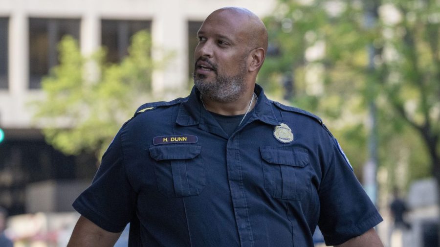 Officer Harry Dunn is photographed outside court.