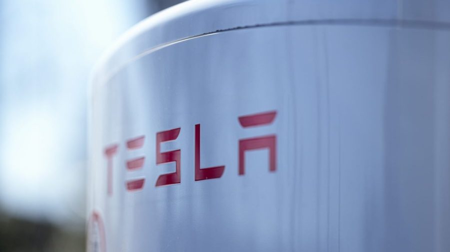 Tesla's red logo is seen on one of its electric vehicle chargers.