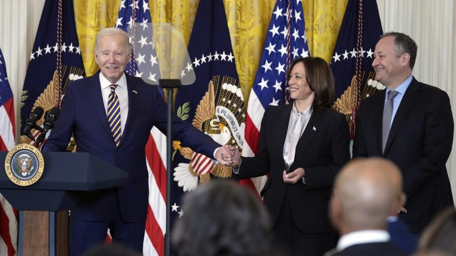 President Biden and Vice President Harris hold hands during a Black History Month reception.