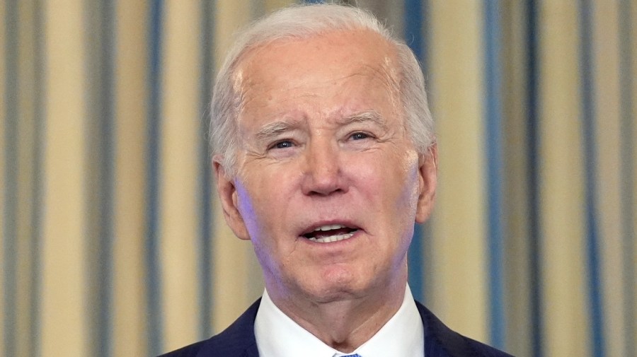 President Biden is seen in a close-up as he speaks at the White House.