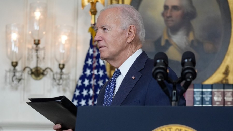 President Biden steps away from the podium after speaking.