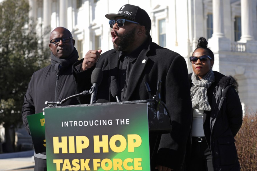 Willie "Prophet" Stiggers, co-founder and president of the Black Music Action Coalition, speaks as U.S. Rep. Jamaal Bowman (D-NY) listens during a news conference outside the U.S. Capitol on February 14, 2024 in Washington, D.C.