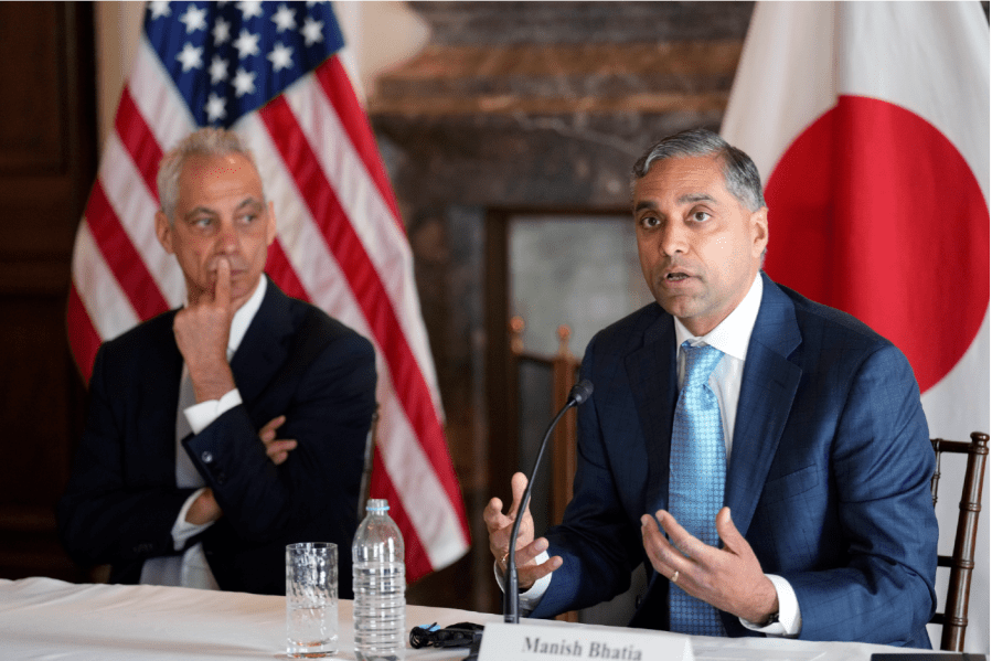 Micron Executive Vice President Manish Bhatia, right, accompanying with U.S. Ambassador to Japan Rahm Emanuel, left, and Virginia Governor Glenn Youngkin, not in picture, speaks during a news conference about U.S.-Japan cooperation on economic issues, including the semiconductor supply chain Thursday, April 27, 2023, in Tokyo.