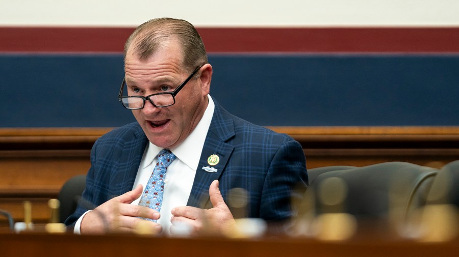 Rep. Troy Nehls gestures while questioning the administrator of the Federal Aviation Administration during a House hearing about American aviation.