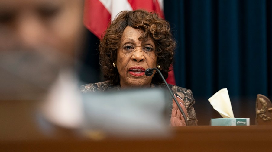 Representative Maxine Waters speaks at a congressional hearing.