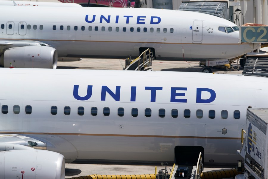 FILE - Two United Airlines Boeing 737s are parked at the gate at the Fort Lauderdale-Hollywood International Airport in Fort Lauderdale, Fla., July 7, 2022. United Airlines said Friday, March 22, 2024, that federal regulators are increasing their oversight of the carrier following a series of recent incidents including a piece of the outer fuselage falling off one jet and another suffering an engine fire on takeoff. (AP Photo/Wilfredo Lee, File)