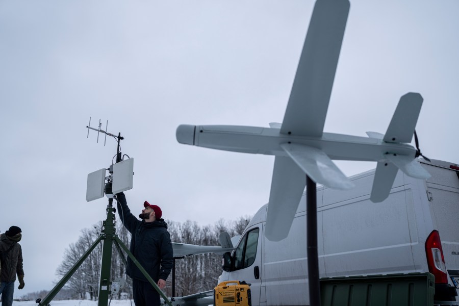 An engineer assembles an antenna for guiding an exploding drone in Kyiv region, Ukraine, on Saturday, February 10, 2024. (AP Photo/Evgeniy Maloletka)