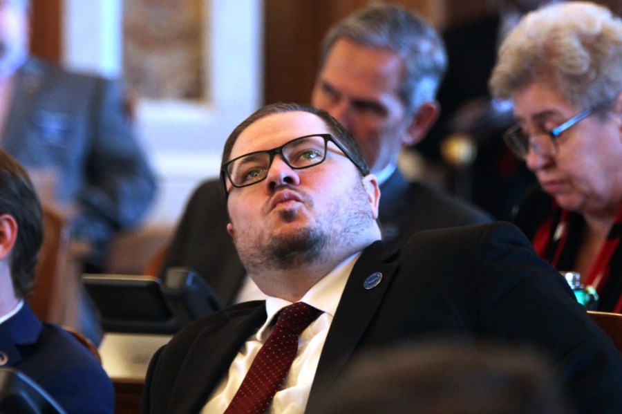 Kansas state Rep. Nick Hoheisel, R-Wichita, watches an electronic tally board in the House as it approves a bill requiring pornography websites to verify the age of Kansas visitors, Tuesday, March 26, 2024, at the Statehouse in Topeka, Kan. The measure is going to Gov. Laura Kelly, and at least eight other states have such laws. (AP Photo/John Hanna)