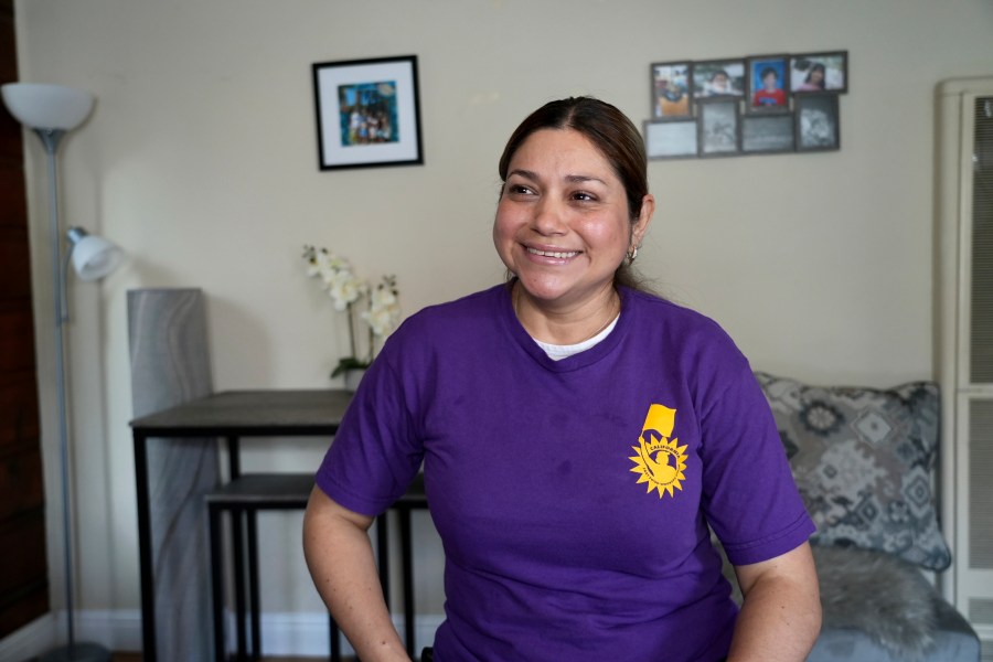 Ingrid Vilorio, who works at a Jack in the Box restaurant, sits in her home in Hayward, Calif., Friday, March 22, 2024. She's among hundreds of thousands of California fast-food workers who will be paid $20 an hour starting Monday, April 1. (AP Photo/Terry Chea)