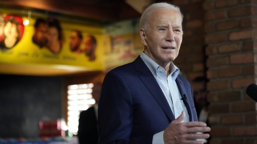 President Biden speaks at a campaign event at a restaurant.