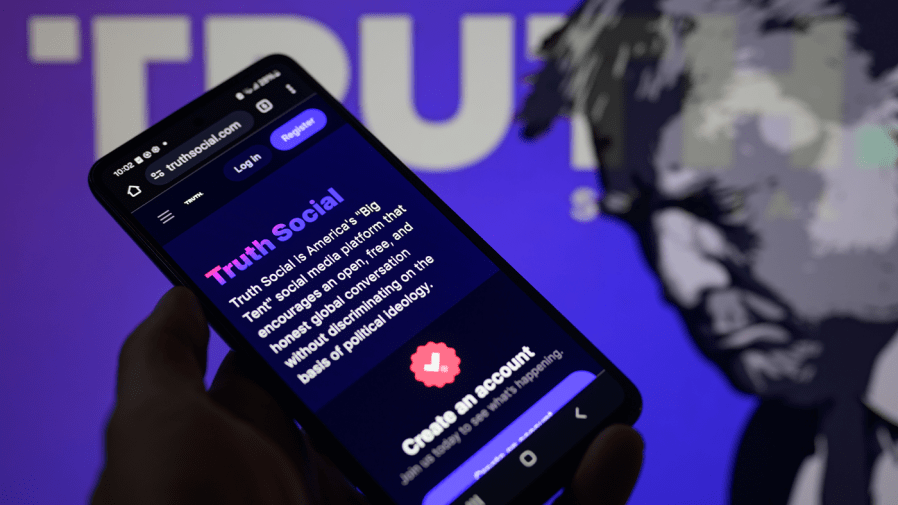 The Truth Social app is displayed on a smartphone with Truth Social visible in the background.