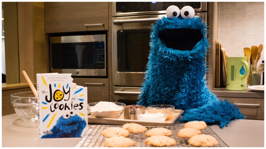 Cookie Monster is pictured in the Washington Post Food Lab with a recipe from his new book, "The Joy of Cookies." (Photo by Sarah L. Voisin/The Washington Post via Getty Images)