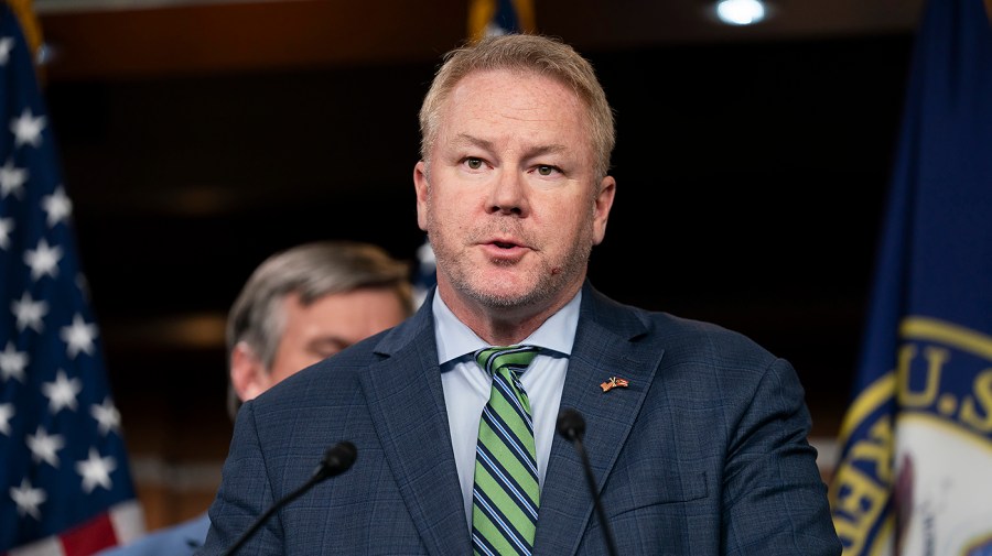 Representative Warren Davidson speaks at a press conference.