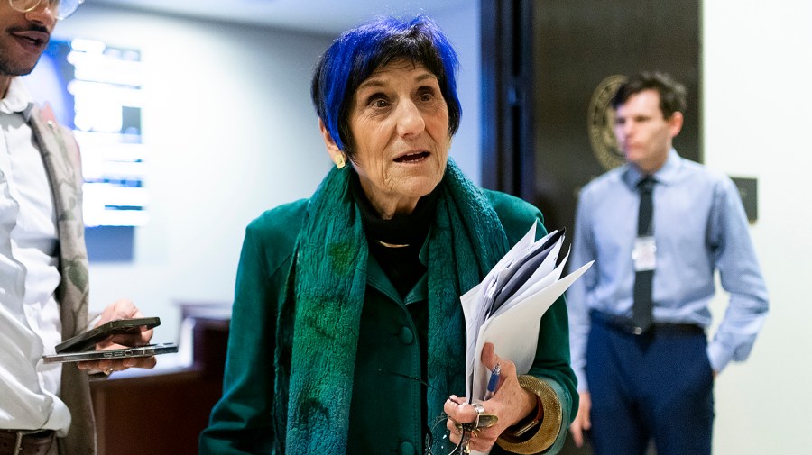 Representative Rosa DeLauro is seen leaving a press conference.