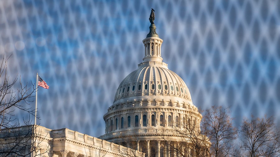 Temporary fencing is put up around the U.S. Capitol in Washington, D.C., ahead of the State of the Union