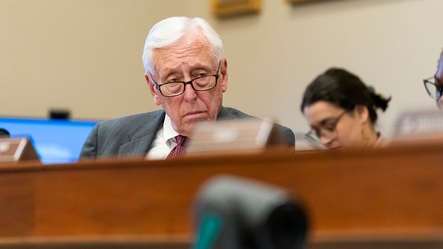 Representative Steny Hoyer looks to the side at a congressional hearing.