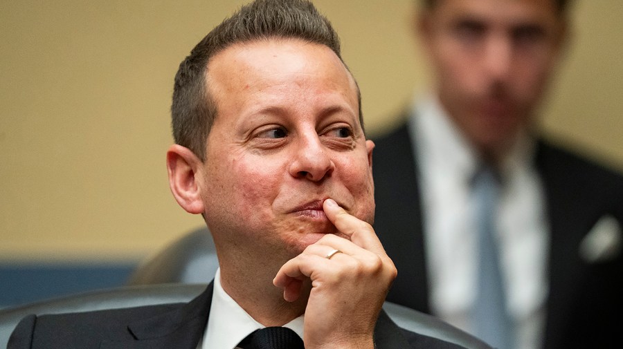 Representative Jared Moskowitz gestures during a congressional hearing.