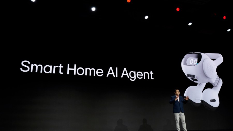 Henry Kim, team leader, ThinQ Platform Business at LG Electronics, announces the company's new smart home AI robot during an LG news conference before the start of the CES tech show Monday, Jan. 8, 2024, in Las Vegas.