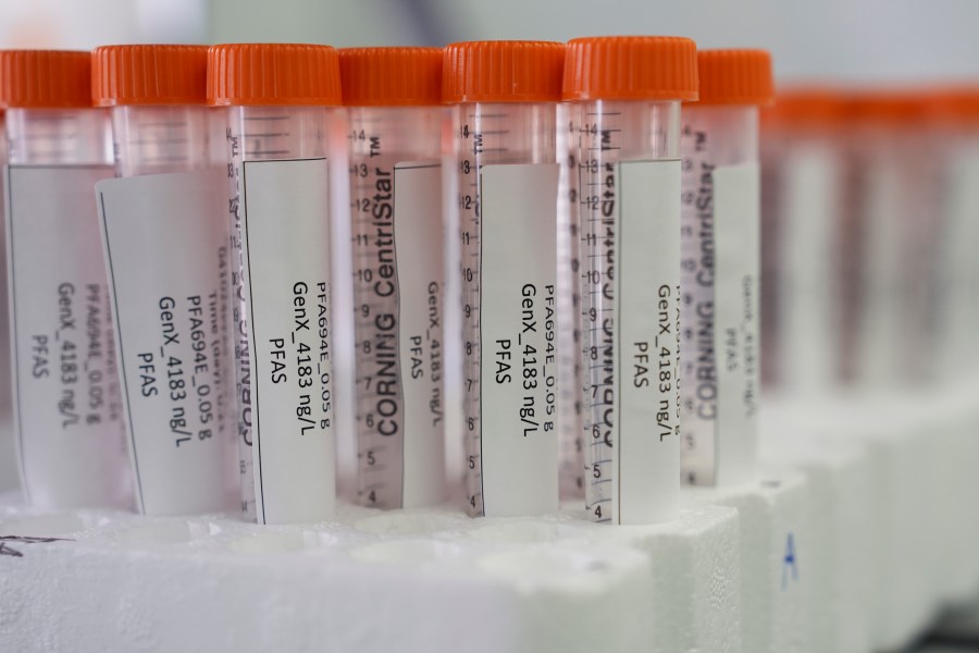 Vials containing PFAS samples sit in a tray, Wednesday, April 10, 2024, at a U.S. Environmental Protection Agency lab in Cincinnati. The Environmental Protection Agency on Wednesday announced its first-ever limits for several common types of PFAS, the so-called "forever chemicals," in drinking water. (AP Photo/Joshua A. Bickel)