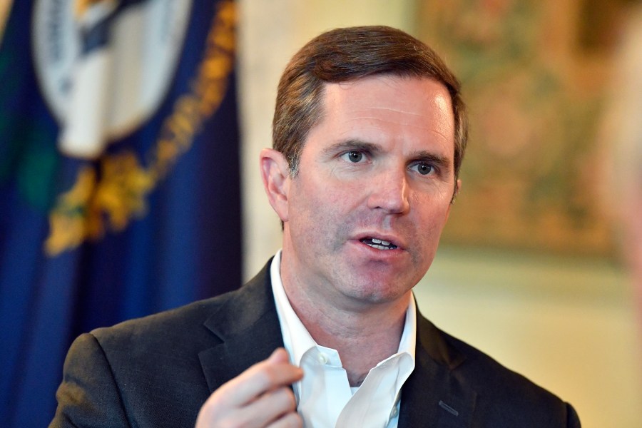 FILE - Kentucky Gov. Andy Beshear responds to a question during an interview, Dec. 19, 2023, in Frankfort, Ky. Kentucky will use a lottery system to award an initial round of licenses to businesses competing to participate in the state's startup medical cannabis program, Beshear announced Thursday, April 18, 2024. (AP Photo/Timothy D. Easley, File)