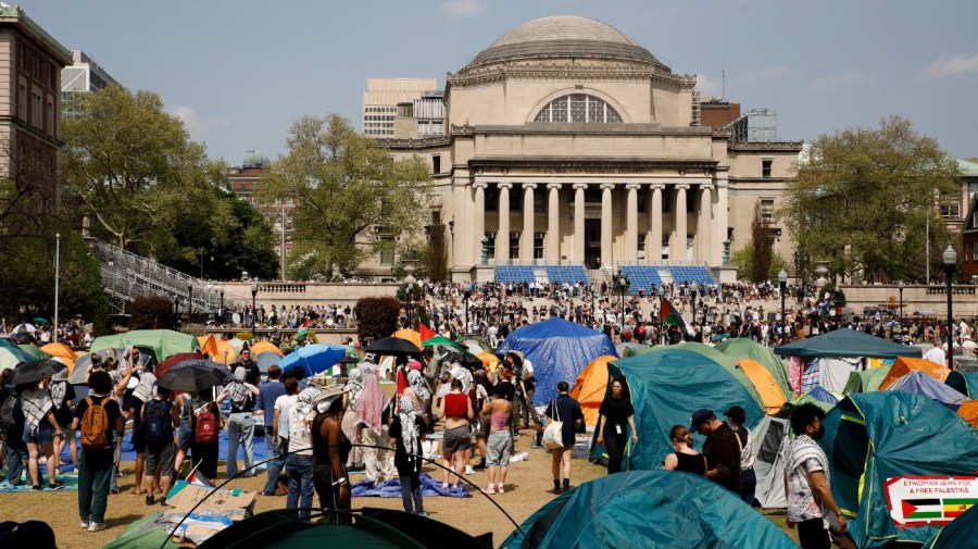 Student protesters gather in protest inside their encampment on the Columbia University campus, Monday, April 29, 2024, in New York. Protesters of the war in Gaza who are encamped at Columbia University have defied a deadline to disband with chants, clapping and drumming. (AP Photo/Stefan Jeremiah)