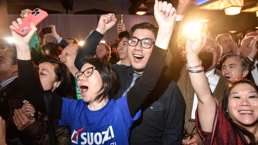 Supporters celebrate victory by Democratic U.S. House candidate Tom Suozzi in the special election to replace Republican Rep. George Santos on February 13, 2024 in Woodbury, New York.