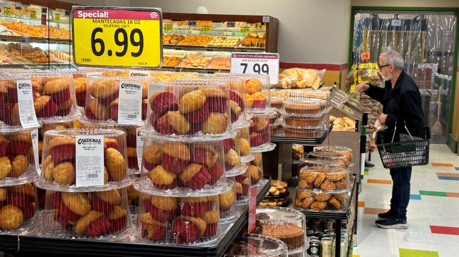 A customer shops for food at a grocery store on March 12, 2024 in San Rafael, California.