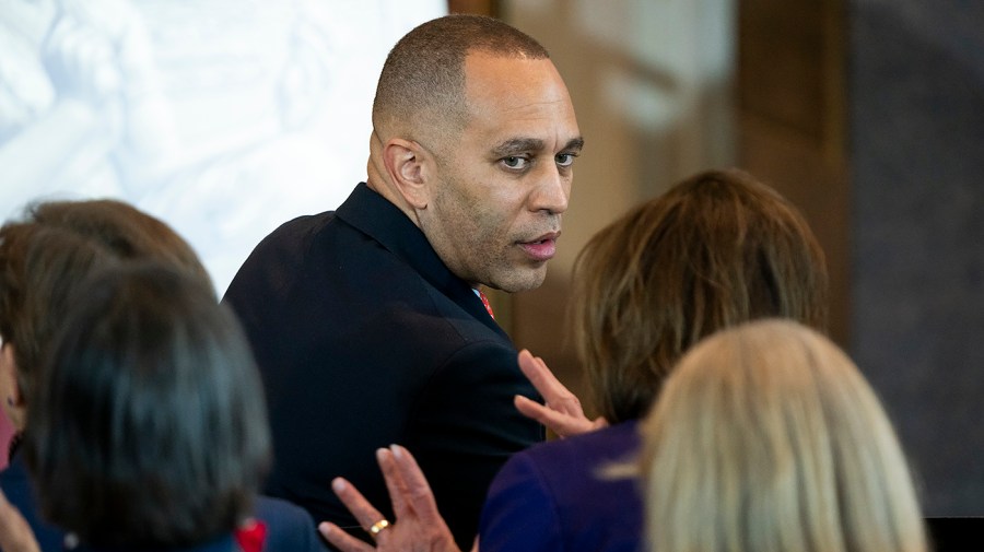 Minority Leader Hakeem Jeffries (D-N.Y.) speaks Rep. Nancy Pelosi (D-Calif.)